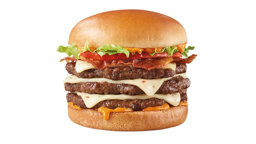 Flamethrower® 1/2Lb* Triple · A Signature Stackburger with three 100% seasoned real beef patties, fiery DQ® FlameThrower® sauce, perfectly melted Pepper Jack, jalapeño bacon, tomato and lettuce on a soft and toasted bun.
*Pre-cooked weight, **Pasteurized process.
