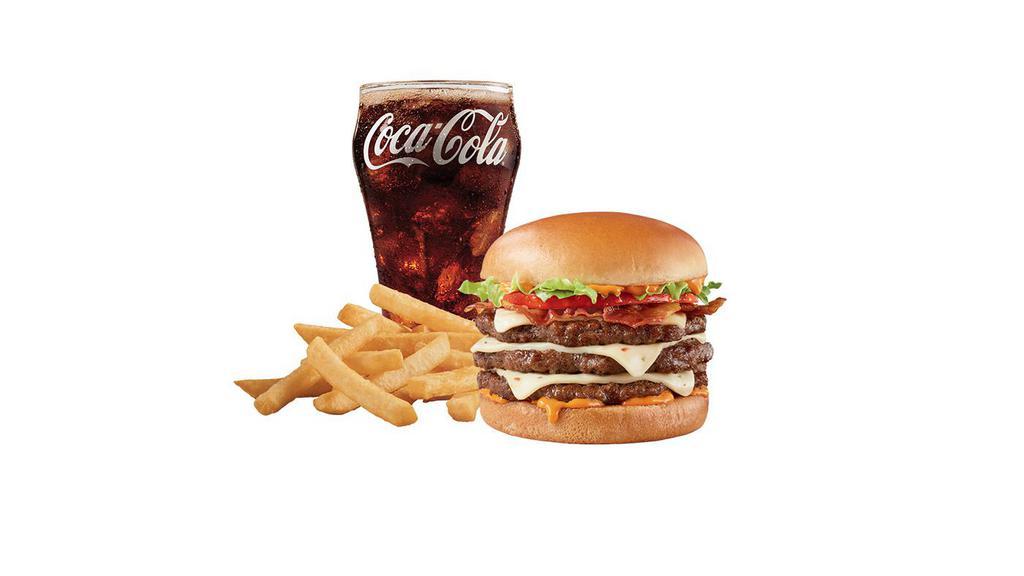 Flamethrower® 1/2Lb* Triple Combo · A Signature Stackburger with three 100% seasoned real beef patties, fiery DQ® FlameThrower® sauce, perfectly melted Pepper Jack, jalapeño bacon, tomato and lettuce on a soft and toasted bun and served with fries and a medium drink.
*Pre-cooked weight, **Pasteurized process.