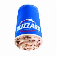 Snickers® Blizzard® Treat · Snickers® pieces and chocolaty topping blended with creamy DQ® vanilla soft serve blended to...