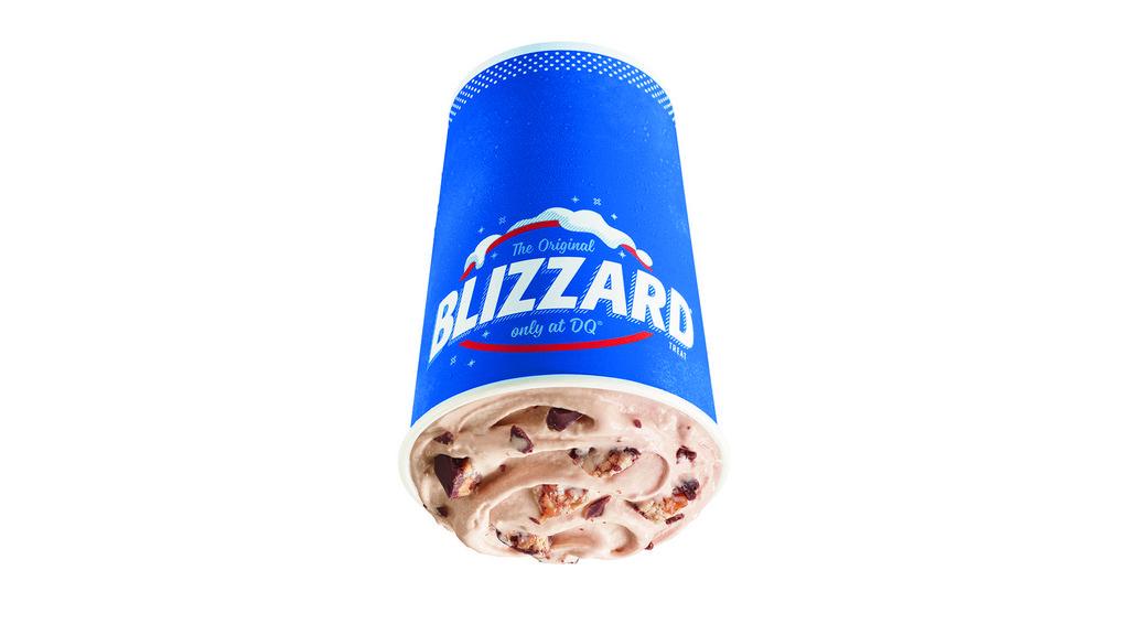 Snickers® Blizzard® Treat · Creamy vanilla ice cream mixed with chopped snickers and chocolate syrup!