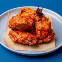 6Pc Bone-In Chicken Wings · Twice fried chicken wings tossed with your choice of sauce.