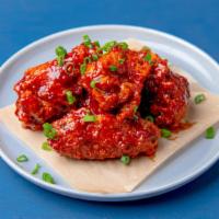 12Pc Bone-In Chicken Wings · Twice fried chicken wings tossed with your choice of sauce.
