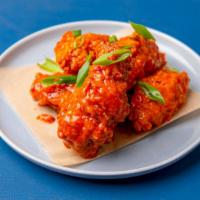 6Pc Boneless Chicken Wings · Twice fried chicken wings tossed with your choice of sauce.