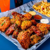 48Pc Boneless Chicken Wings · Twice fried chicken wings tossed with your choice of sauce.