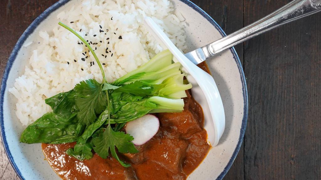Beef Panang Curry With Rice · Spicy. Our spiciness is authentic. Served with salad and veggie egg roll.