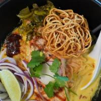 Salmon Curry Noodle · Spicy. Our spiciness is authentic. Grilled Atlantic salmon, egg noodle and spicy coconut cur...