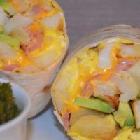 Breakfast Burrito · 3 eggs, fresh house made potatoes, American cheese with a side of our signature spicy salsa.