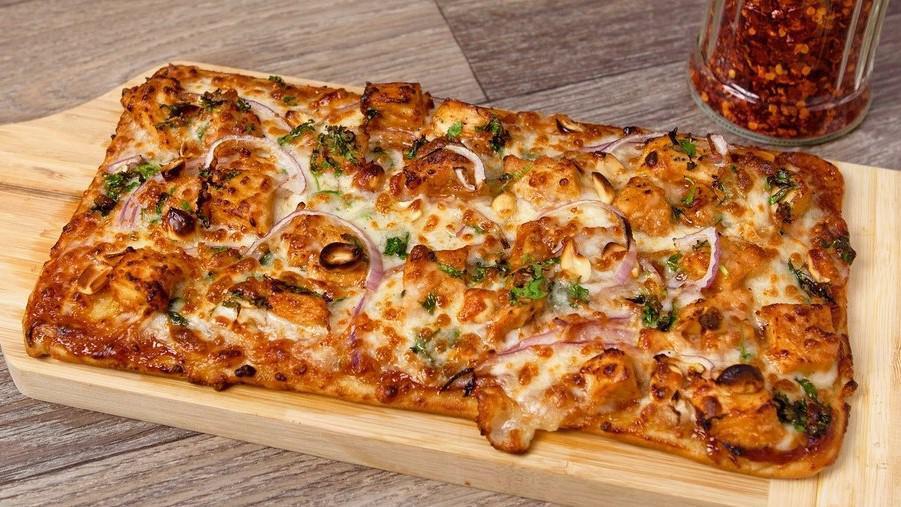 Bbq Chicken · House marinated fresh chicken filet, peanuts, cilantro, red onions and mozzarella cheese with bbq sauce drizzle.