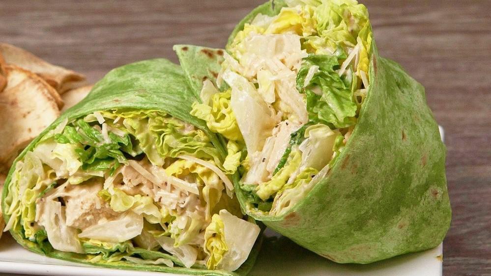 Chicken Caesar Wrap · House marinated fresh chicken filet, romaine lettuce, parmesan cheese with Caesar dressing, wrapped in a spinach tortilla.