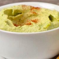 Green Leaf Hummus · 4 oz. house made spinach and parsley hummus served with house baked pita chips.