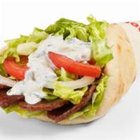 Gyro Wrap · Served with lamb, beef or chicken. Comes with fresh tomatoes, lettuce, onions, tzatziki sauc...