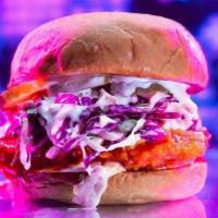 Buffalo Chicken Sandwich · country fried chicken breast tossed in buffalo sauce, slaw, lemon-herb mayo, pickles, brioch...