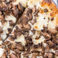 Mushroom Truffle Pizza · Wild mushroom, mozzarella, truffle oil, garlic cream sauce.