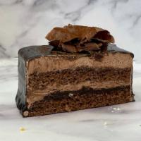 Chocolate Ganache · Our best-selling chocolate cake! Chocolate sponge cake filled with chocolate mousse and choc...