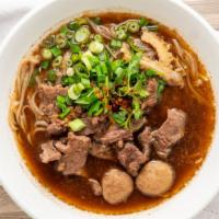 Boat Noodle Beef · Noodles with beef, liver, a beef ball and tripe in a flavored broth. Hot and spicy.