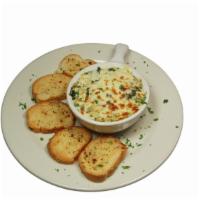 Spinach & Artichoke Dip · Tender spinach and artichoke hearts in a bubbling blend of three kinds of cheese and served ...
