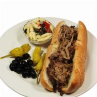 Steak & Onion Submarine · Thinly sliced ribeye steak, sautéed onions in butter and extra virgin olive oil. Choice of p...