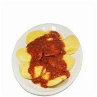 Ravioli With Sauce
 · Choice of meat or cheese ravioli topped with our house-made hearty meat sauce or marinara sa...