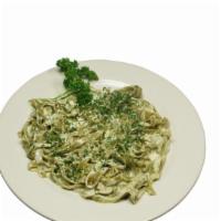 Fettuccine Alfredo · Fettuccine tossed in our creamy alfredo sauce with parmesan and romano cheese. Choice of tra...