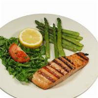 Grilled Salmon · Grilled skinless Atlantic salmon fillet seasoned and finished with a side of our house garli...
