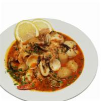 Seafood Arrabiata · Jumbo shrimp, scallops, calamari, and clams in a light spicy tomato sauce. Choice of minestr...