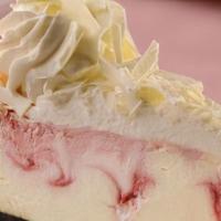 Raspberry White Chocolate Cheesecake · Swirled with imported seedless raspberry and pieces of white chocolate baked on a chocolate ...