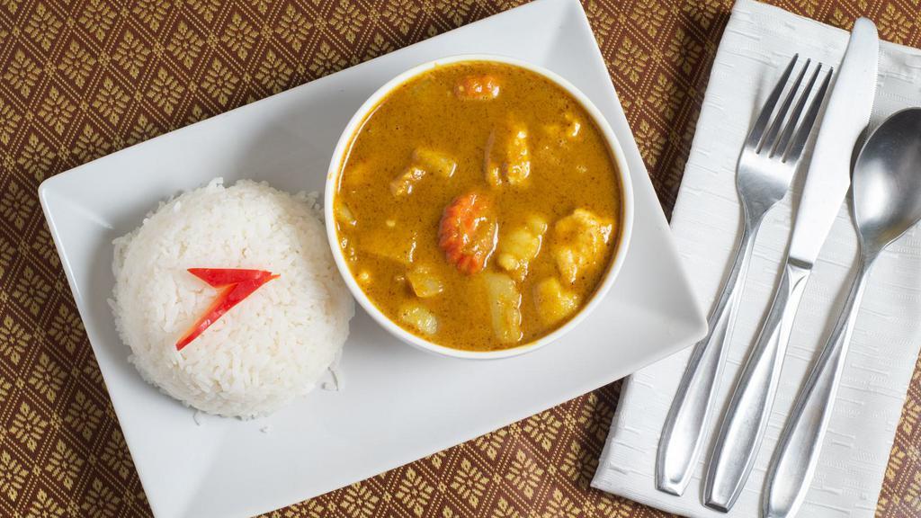 Yellow Curry (Rice Not Included) · Yellow curry paste with coconut milk, potato, white onion and carrots.