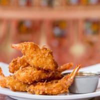 Coconut Shrimp · Butterfly prawns tossed in coconut and fried.