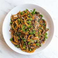 Butternut Squash Lo-Mein With Peas And Crimini Mushrooms · Pan-roasted butternut squash noodles with peas, crimini mushrooms, green peppers, and fresh ...