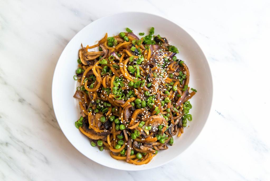 Butternut Squash Lo-Mein With Peas And Crimini Mushrooms · Pan-roasted butternut squash noodles with peas, crimini mushrooms, green peppers, and fresh ginger.