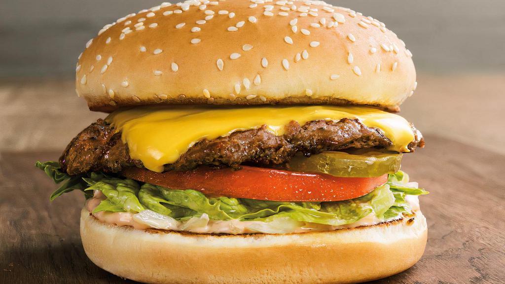 Big Cheese® · The 'go to' for cheeseburger lovers. A 1/4 lb. 100% USDA fire-grilled pure beef patty, American cheese, crisp lettuce, freshly sliced tomato, dill pickles, diced onion, and house-made 1000 island dressing on a locally baked toasted sesame seed bun. What’s not to love?