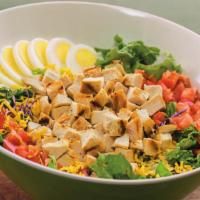 Charbroiled Chicken Salad · Simple and amazing. All-natural grilled chicken breast, diced tomato, shredded cheddar chees...