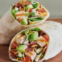 Farmer’S Chopped Cobb Wrap™ · Grilled all-natural chicken breast, hand-diced Hass avocado, hickory-smoked bacon, shredded ...