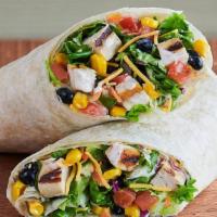 Southwest Chicken Wrap · Savor the flavor with grilled all-natural chicken breast, fire-roasted corn, black beans, sh...