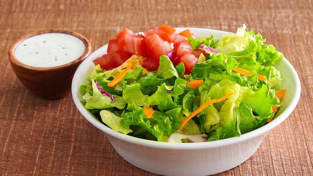 Side Salad · Hand-chopped green salad mix and farm fresh diced tomato. The perfect complement to your favorite burger or sandwich. Also available as a combo option.
