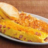 Ham And Cheese Omelet · A classic. Cooked to order, 3 cage-free eggs, hand-cracked and cooked-to-order with diced sm...