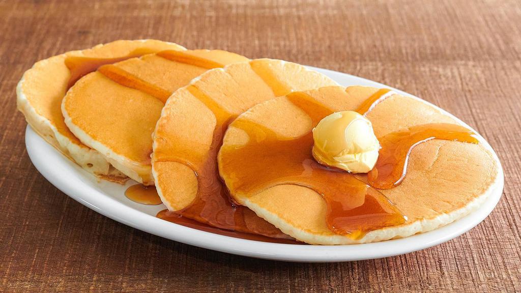 4 Hot Cakes · Fluffy, yummy, hot-off-the-griddle buttermilk hot cakes, topped with whipped margarine, served with maple-flavored syrup, and made just for you.