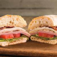 Farmer'S Club Sandwich ™ · Locally baked La Brea ciabatta, piled high with sliced ham and turkey, hand-sliced tomato, c...