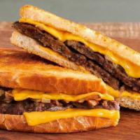 Patty Melt · Loaded with 1/4 lb. of USDA fire-grilled pure beef, American cheese, and grilled onions. All...