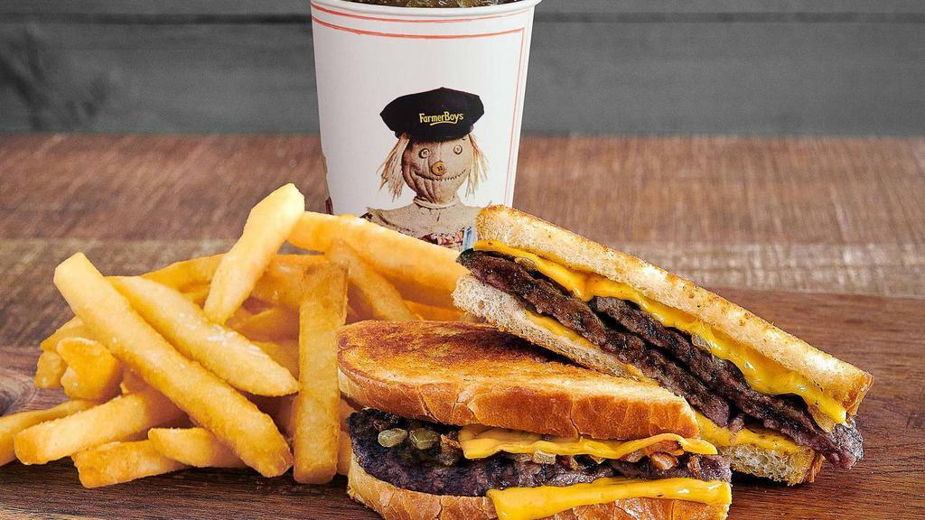 Patty Melt Combo · Patty Melt, Always Crispy Fries®, and a Regular Fountain Drink. Loaded with 1/4 lb. of USDA fire-grilled pure beef, American cheese, and grilled onions. All on locally-baked toasted sourdough bread. This one will melt your appetite.