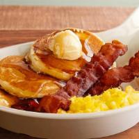 Mini Cakes Skillet · 3 silver dollar hot cakes served with maple-flavored syrup, a cage-free and hand-cracked scr...