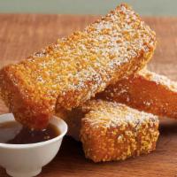 Crispy French Toast Dippers · 3 freshly battered and cooked up crispy locally baked bread sticks, dusted with cinnamon, po...