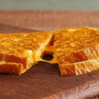 Parm-Crusted Grilled Cheese · Locally baked sourdough, loaded with 3 slices of melted American and pepper jack cheese and ...