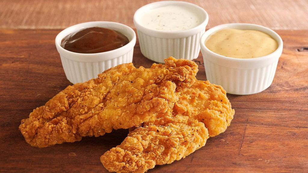 Fried Chicken Dippers · 2 tender white meat chicken strips, seasoned and battered, and fried to crispy perfection. Served with ranch dressing on the side.