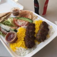 Luleh Kebab · One skewer luleh ground beef or chicken,rice, green salad, hummus and pita bread.