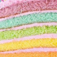 Rainbow Strawberry Cake Slice · Six layers of rainbow-colored vanilla cake filled and iced with sweet strawberry buttercream...
