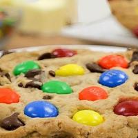 M&M Cookie  · Soft-baked chocolate chip cookie with chocolate M&Ms.