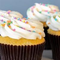 Vanilla Buttercream Cupcake · Vanilla cupcake topped with sweet buttercream icing and sprinkles.