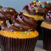 Vanilla Fudge Cupcake · Vanilla cupcake topped with rich chocolate fudge icing