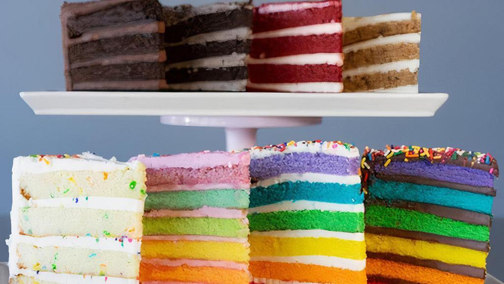 6-Pack Cake Slice · Six of our most popular cake slices including Rainbow, Rainbow Fudge, Vanilla Confetti, Chocolate Fudge, Red Velvet, and Carrot. Flavors subject to change.